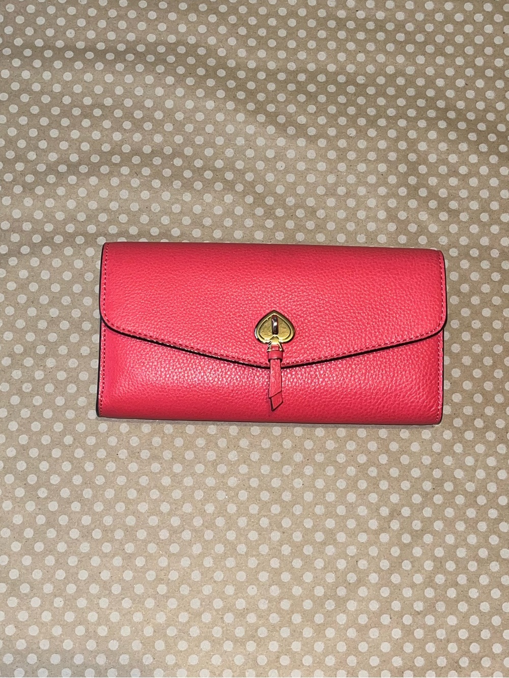 kate spade Coral-Pink Pebbled Leather Envelope Clutch with Gold Turn-Lock detail